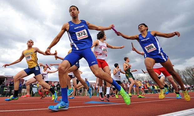 Pat Sheil of St. Louis University (373) and Albert Marban of St. Louis University (365) compete in the men's 4x400 meter relay on Day 2 of the 2014 Atlantic 10 Outdoor Track and Field Championships.