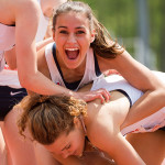 Richmond's Alyson McGonigle reacts with teammate Taylor Clevinger (below) after their 4x800 meter team won the event at the 2015 Atlantic 10 Outdoor Track and Field Championships at George Mason University on May 3, 2015 in Fairfax, Virginia.